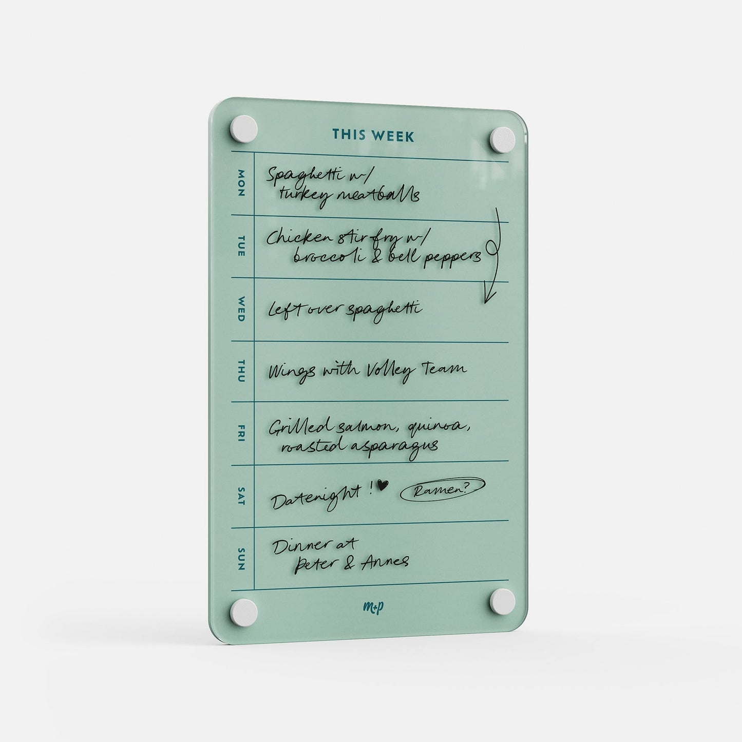 The "This Week 69" glass weekly organizer displays handwritten notes of meals—spaghetti, chicken stir-fry, leftovers, wings, salmon, and dinner with Peter & Annas—on a white background and doubles as an appointment tracker.
