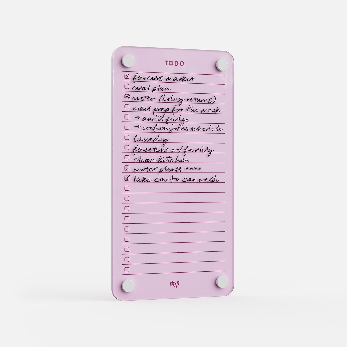 Todo List 59 is a pink reusable to-do board featuring handwritten tasks in black ink, white circular magnets at the corners, and sections for checked or crossed-off items—making it a stylish, effective daily task organizer.