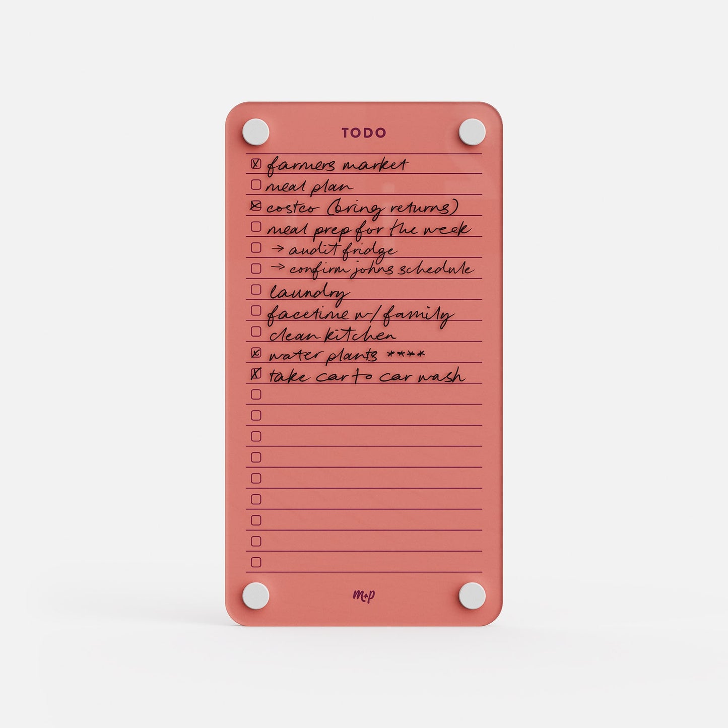 Todo List 59 is a pink daily organizer featuring handwritten tasks like farmers market, meal plan, laundry, clean kitchen, water plants, and car wash. Some items are checked off. It’s held in place with white round magnets at each corner.
