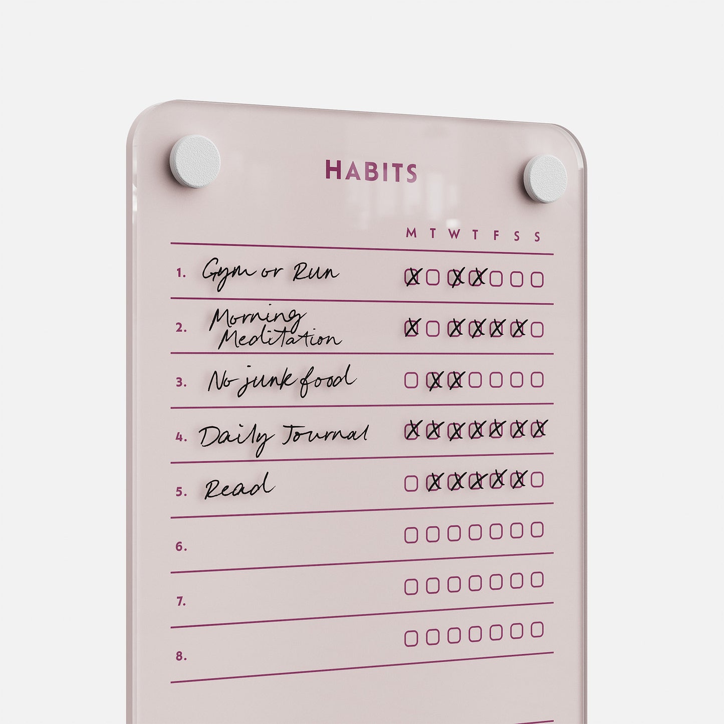 Premium pink acrylic erasable and reusable weekly habit board tracks five goals with daily checkboxes: Gym/Run, Meditation, No Junk Food, Journal, Read.