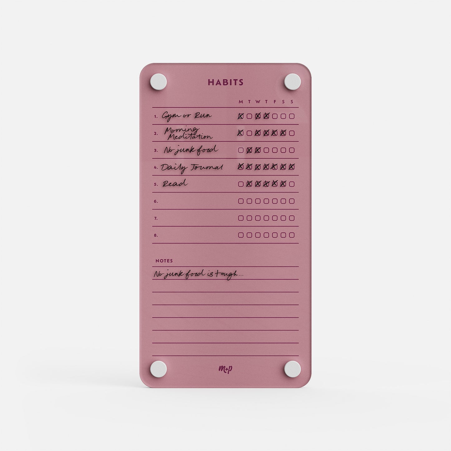Weekly Habits 59 is a pink magnetic tracker and goal board that lists daily habits like exercise, meditation, and reading with weekly checkboxes—some checked—plus space for handwritten progress notes at the bottom.