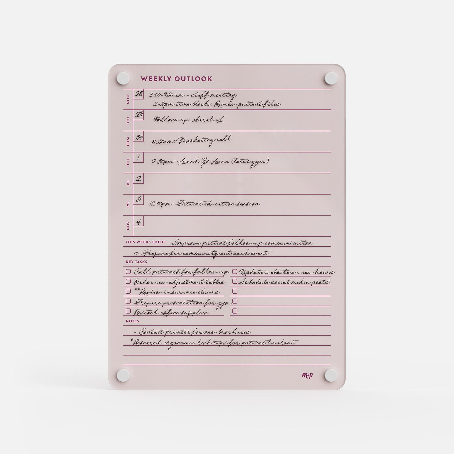 The Weekly Outlook 811 is a pink dry-erase weekly planner and productivity organizer with space for handwritten schedules and priorities. It mounts easily using four round magnets, one at each corner.