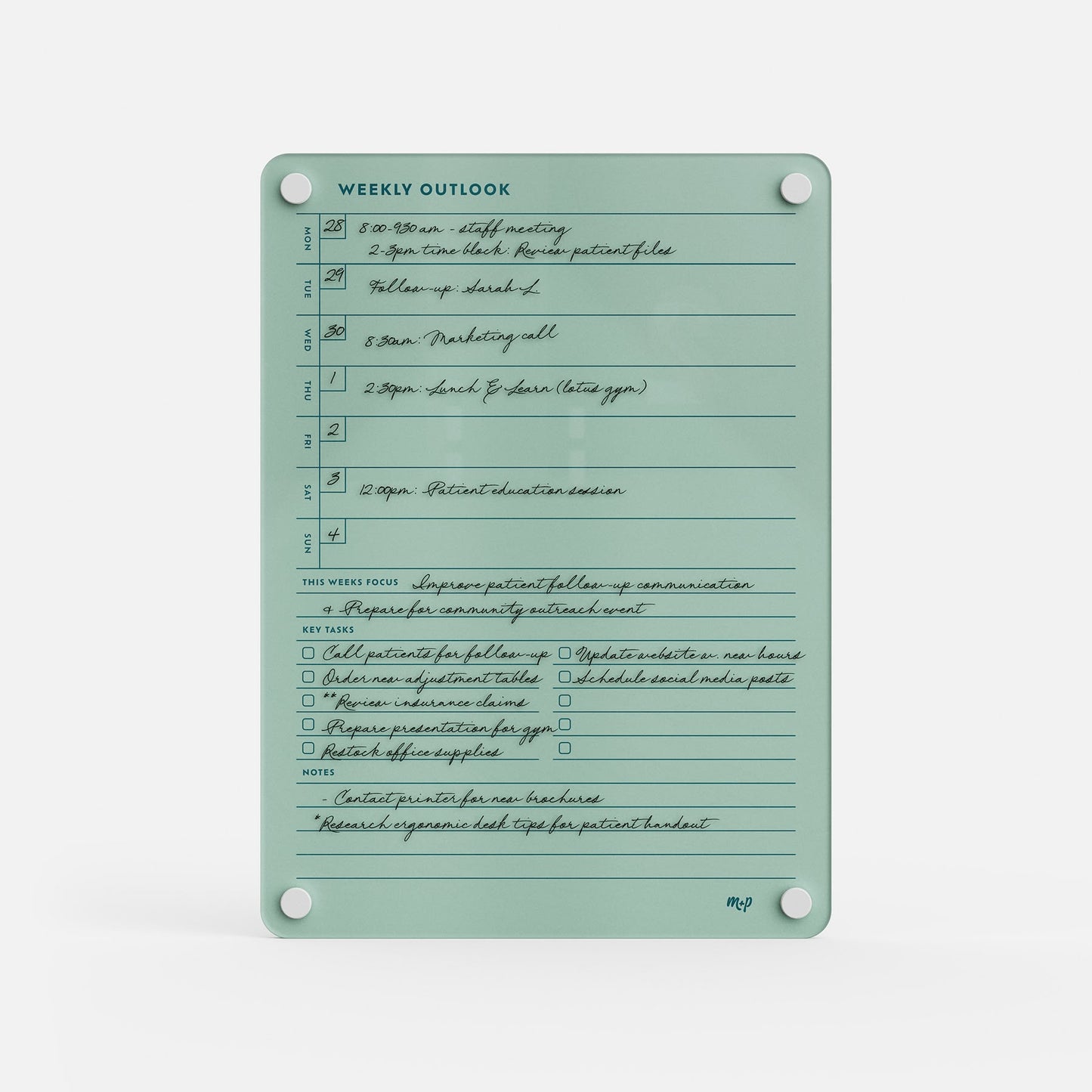 The Weekly Outlook 811 is a mint-green dry-erase planner and productivity organizer featuring time slots, priorities, weekly focus, notes sections, handwritten-style prompts, and visible metal corner fasteners.
