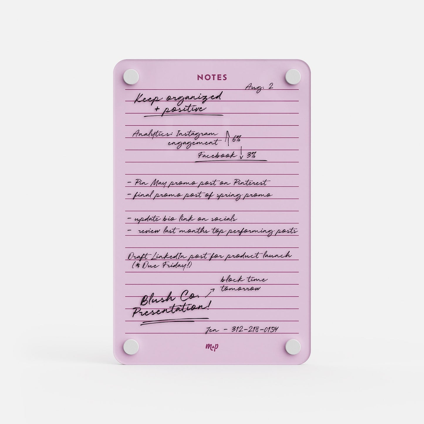 Lined Notes 69 is a pink notepad with lined pages, ideal for lists and reminders like "Keep organized & positive," social media tasks, or presentations. Held by four white magnets, it's perfect for organization or as a planning board.
