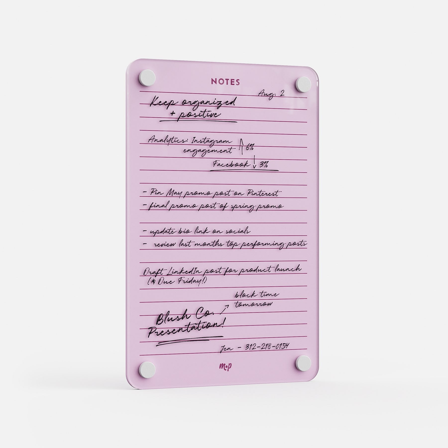 Lined Notes 69 is a pink dry-erase planning board with handwritten task lists for Instagram, Pinterest, product launch, and contact info. Four white corner magnets keep it secure and organized.