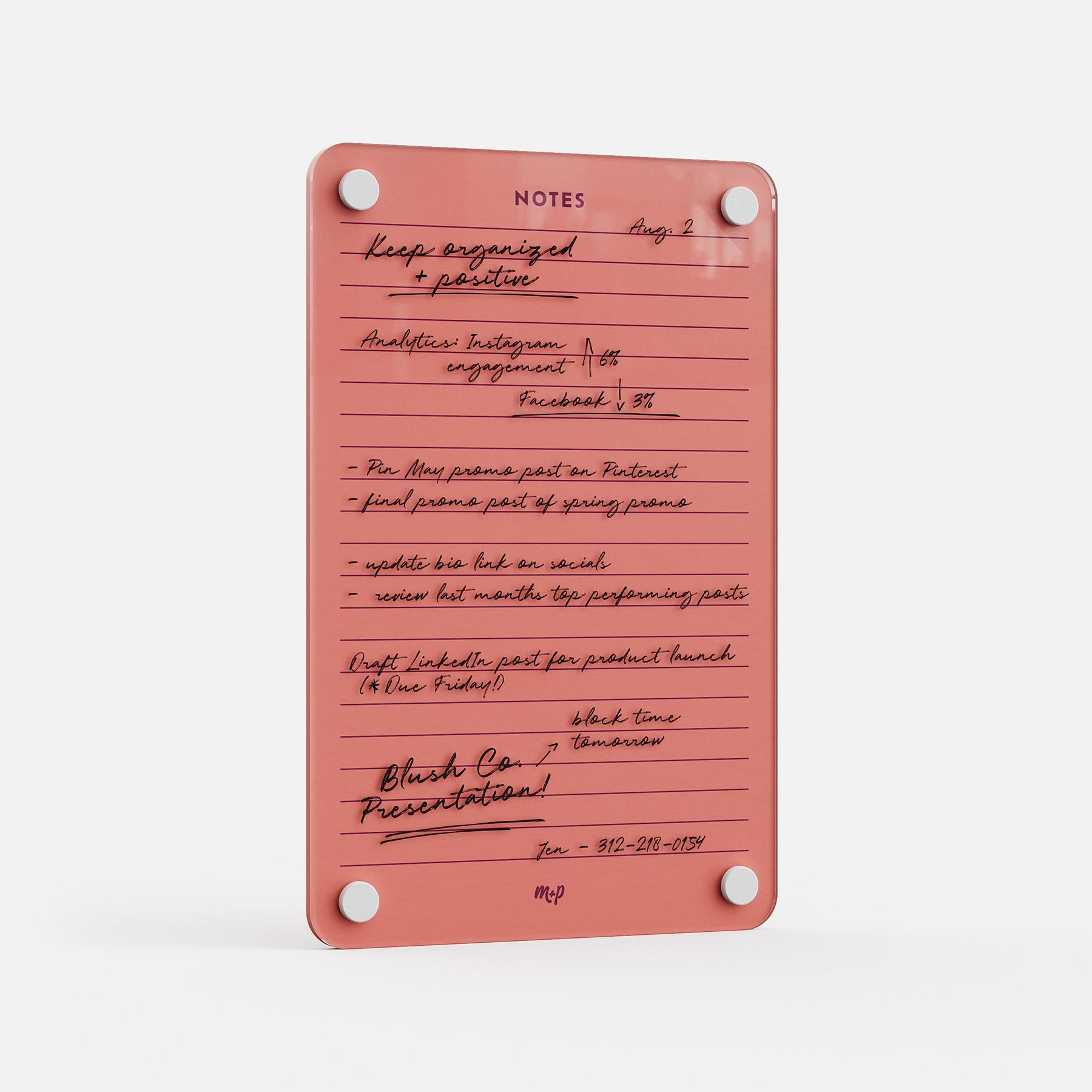 The Lined Notes 69 is a pink acrylic planning board featuring handwritten black marker task lists, secured by four round white magnets at each corner. Standing upright against a white background, it's ideal for effortless organization.