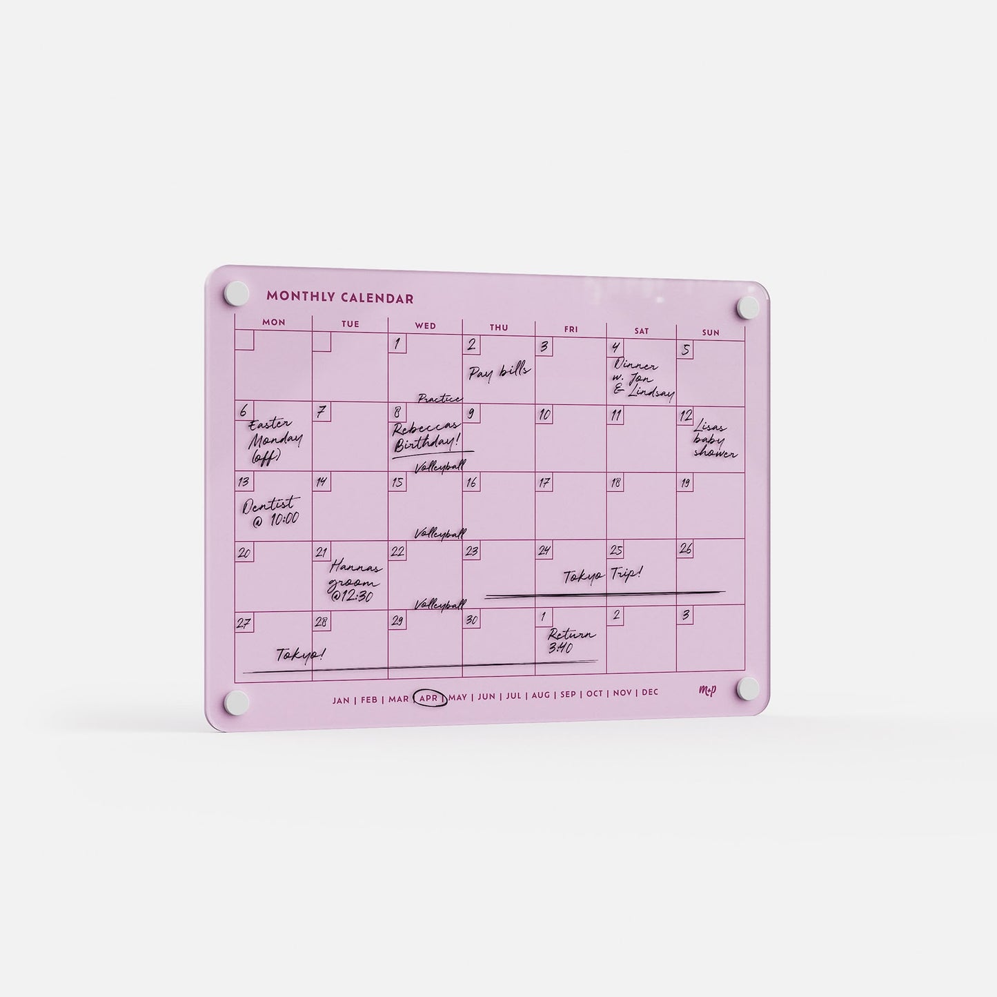The Monthly Calendar 118 is a pink compact planner shown upright, with handwritten events and notes in black marker. Days of the week and month abbreviations line the top and bottom, making it an ideal organizer for families.