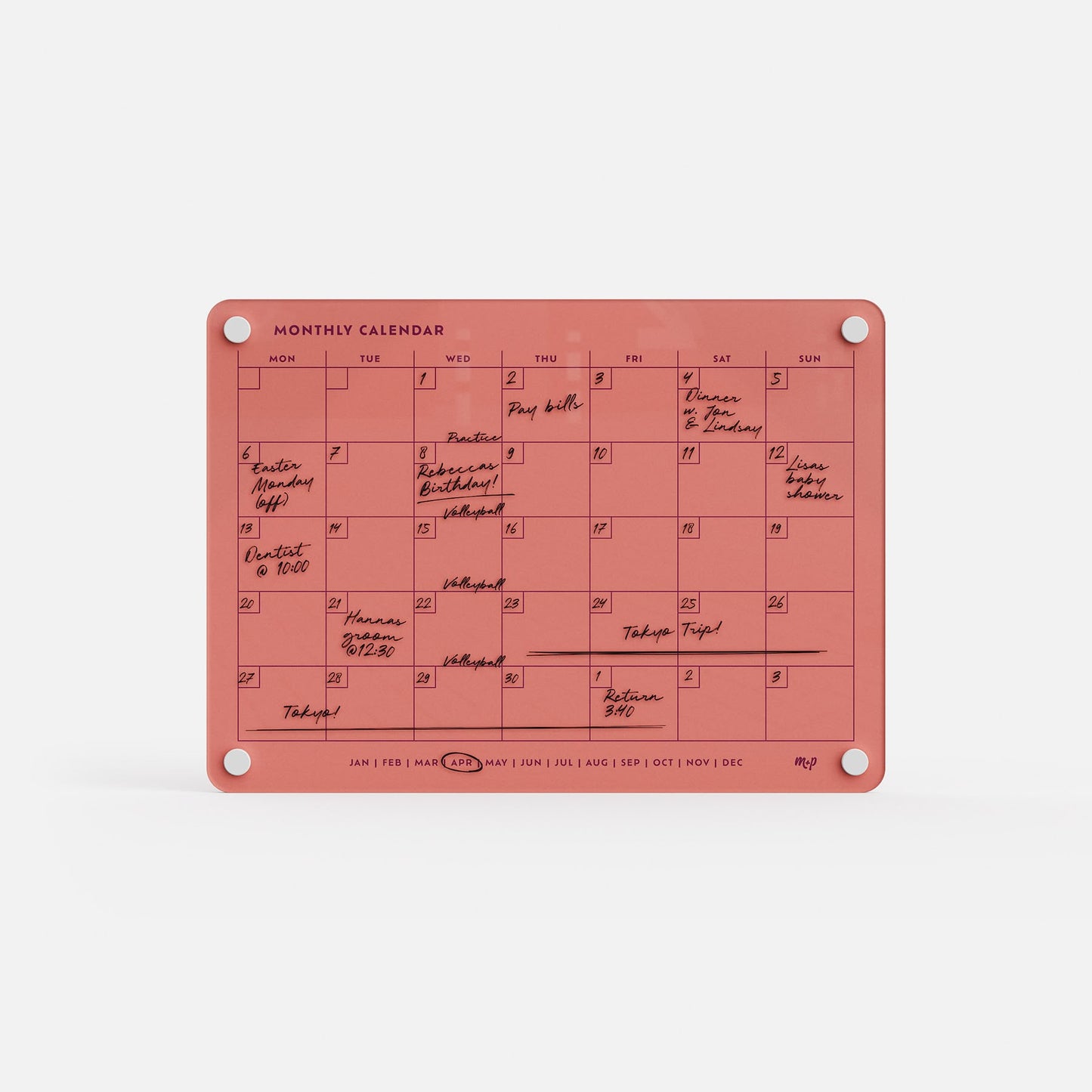 The Monthly Calendar 118 is a red compact calendar featuring handwritten notes and black ink events. It’s mounted with four metal-rimmed corner holes and displays abbreviated months at the bottom.
