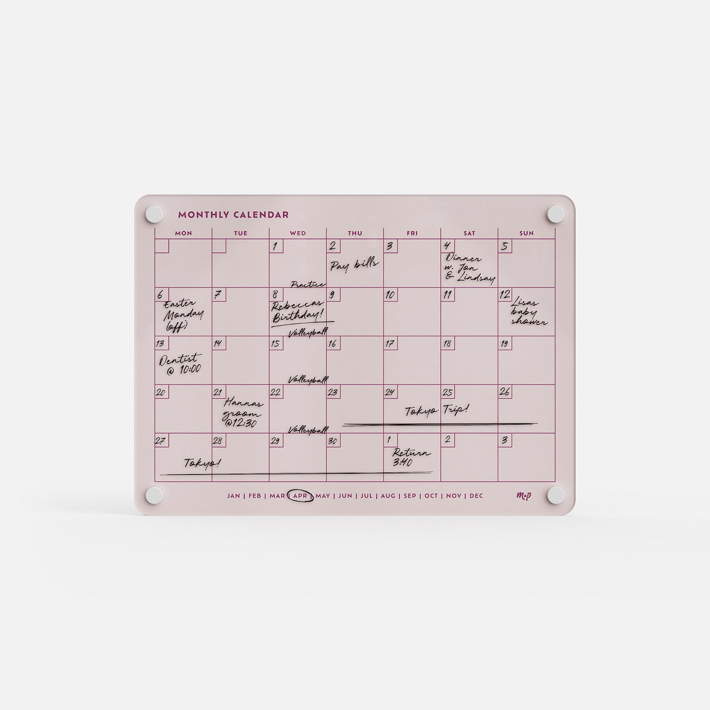 Monkey and Pebbles’ premium acrylic monthly calendar is a pink, erasable, reusable planner with white magnets and months below.