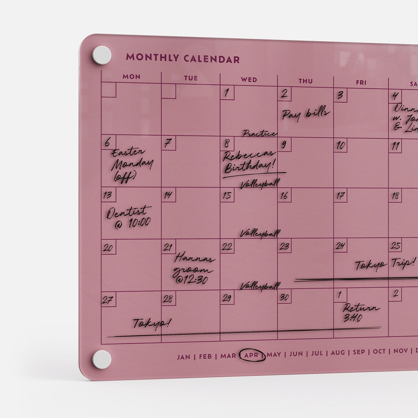 The Monkey and Pebbles Monthly Calendar 118 is a premium, acrylic, erasable, reusable pink wall planner for April with silver mounts.