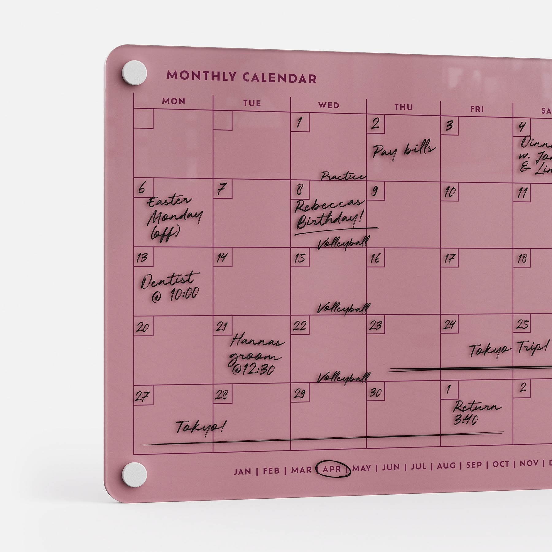 The Monkey and Pebbles Monthly Calendar 118 is a premium, acrylic, erasable, reusable pink wall planner for April with silver mounts.