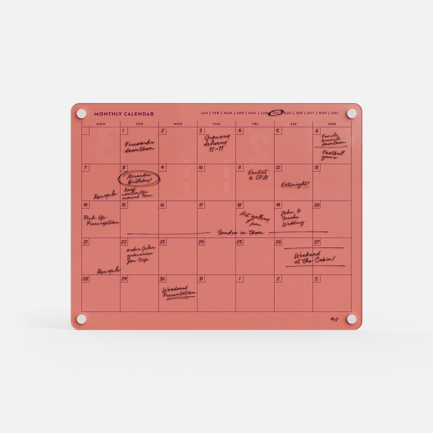The premium acrylic erasable and reusable planner displays handwritten notes, reminders, and circled or underlined dates in black ink.