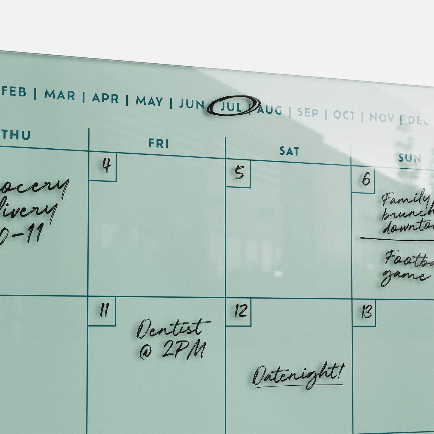 Stay organized with the premium Monkey and Pebbles acrylic calendar 1411—erasable, reusable, July circled, track all your plans!.