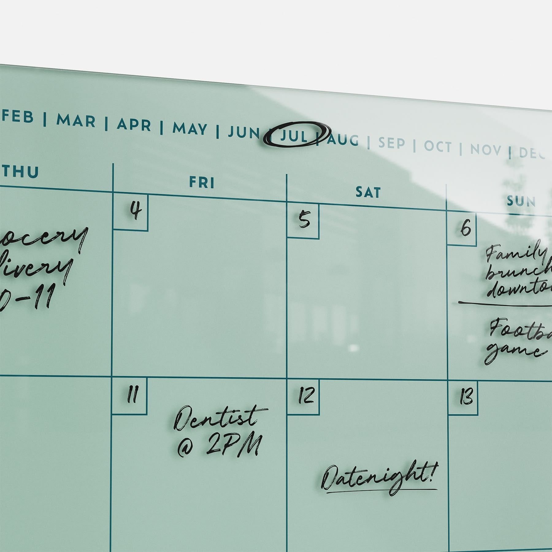 Stay organized with the premium Monkey and Pebbles acrylic calendar 1411—erasable, reusable, July circled, track all your plans!.