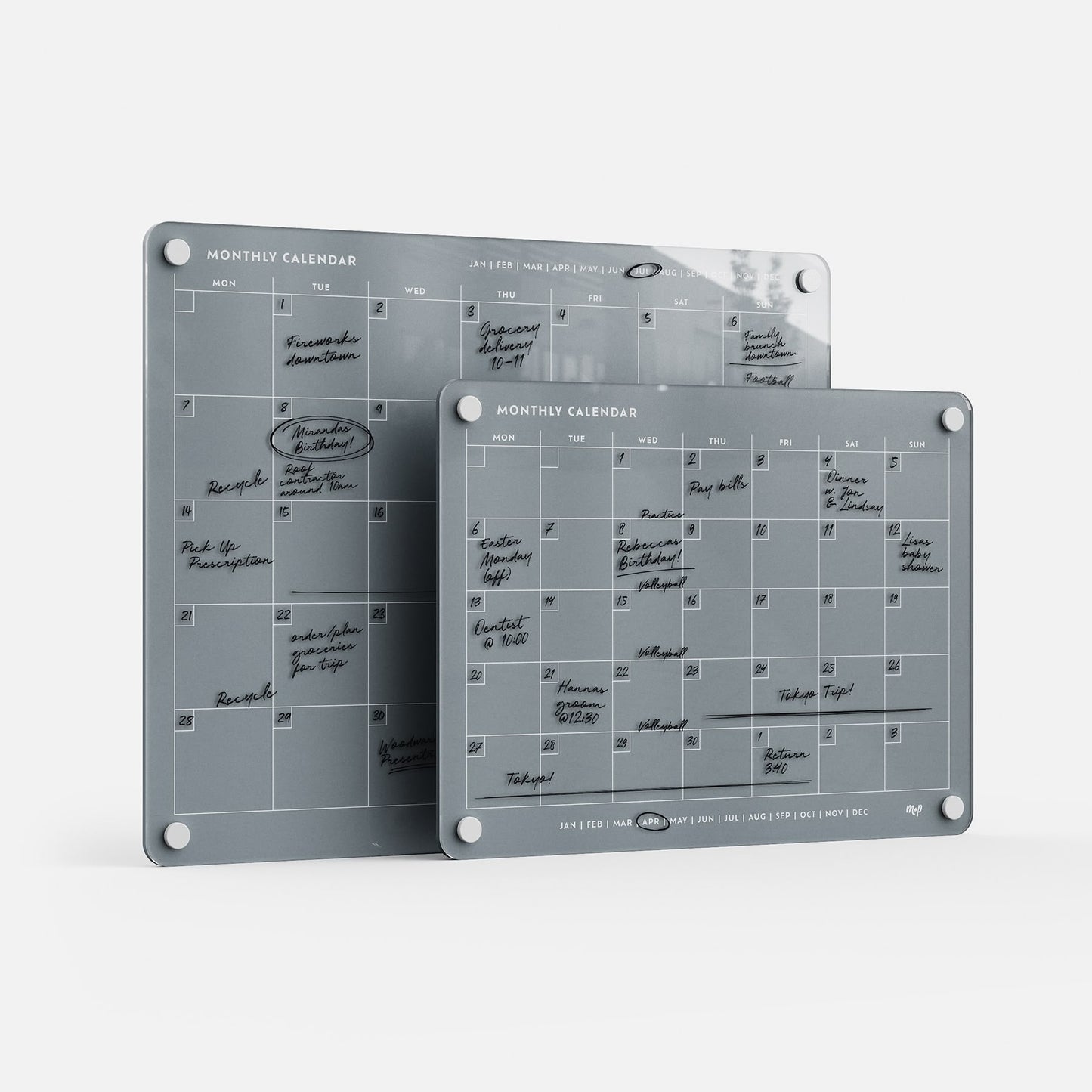 Two premium, reusable acrylic planners with erasable notes overlap. Clear day and month labels keep your family organized in style.