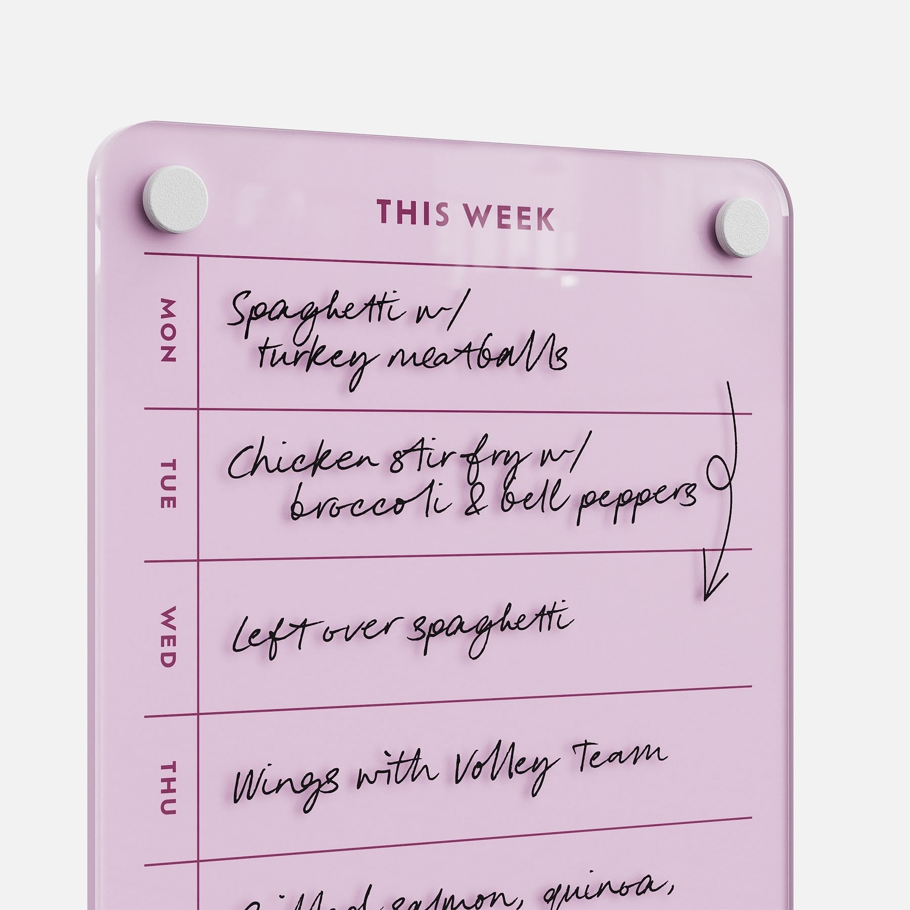 Stay organized and inspired each week with "This Week 69," a pink weekly meal planner featuring handwritten notes: Monday—spaghetti with turkey meatballs, Tuesday—chicken stir fry, Wednesday—leftover spaghetti, Thursday—wings with volley team.