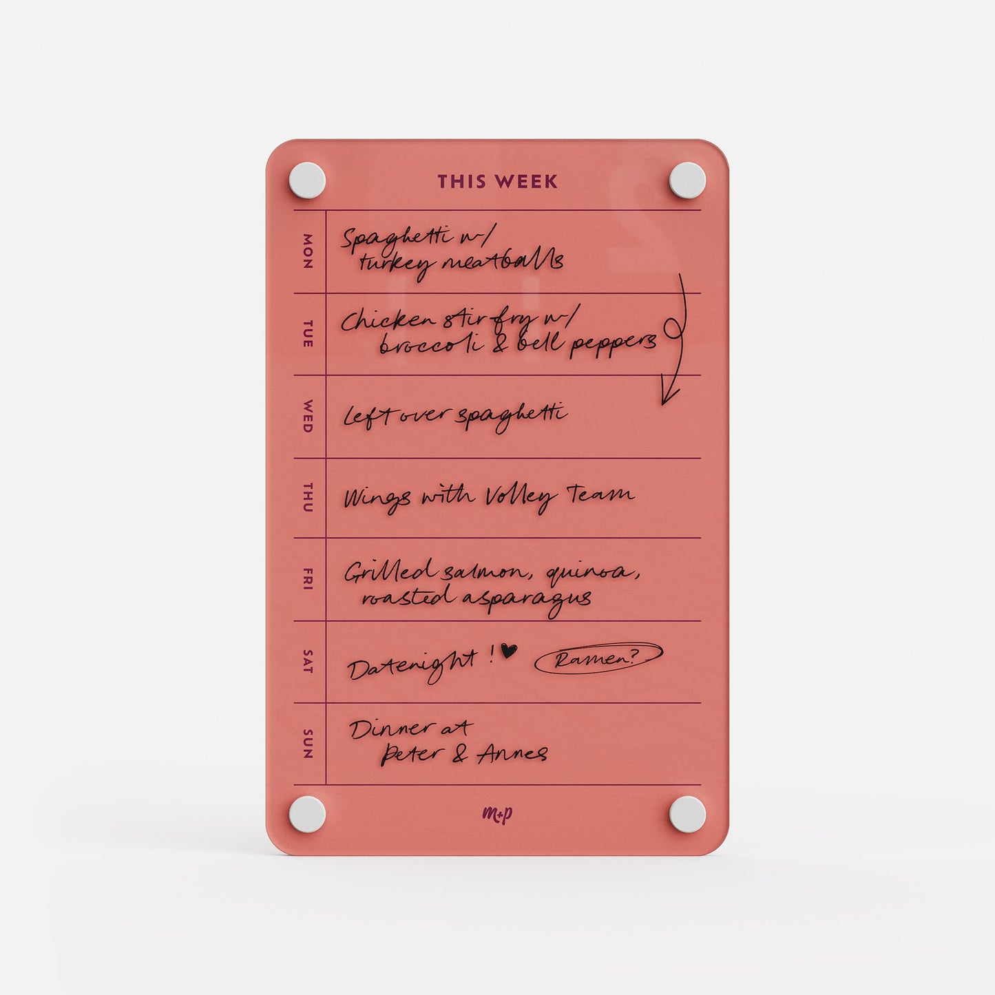 This Week 69 is a pink magnetic meal planner and weekly organizer with handwritten notes for spaghetti, chicken stir-fry, wings, grilled salmon, and a dinner date for each day.