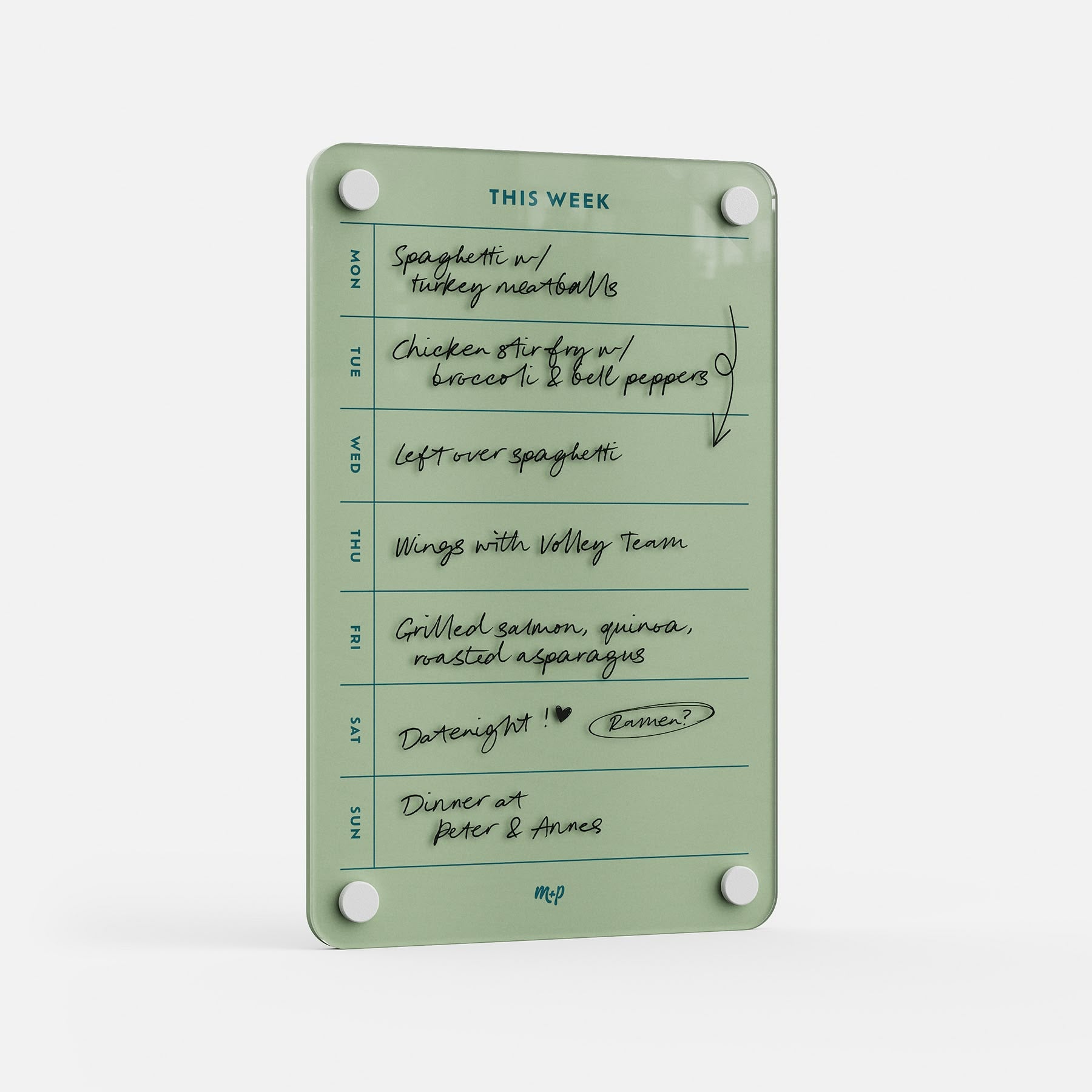 This Week 69 is a green weekly meal planner featuring handwritten meals like spaghetti, chicken stir fry, and dinner at Peter & Anna’s. The organizer is labeled “THIS WEEK” at the top for easy planning.