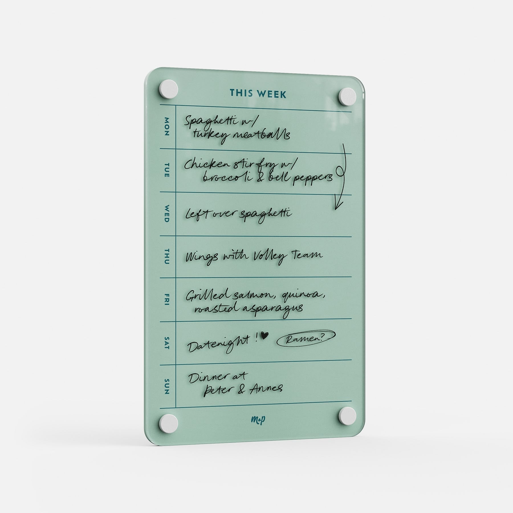 The "This Week 69" glass weekly organizer displays handwritten notes of meals—spaghetti, chicken stir-fry, leftovers, wings, salmon, and dinner with Peter & Annas—on a white background and doubles as an appointment tracker.