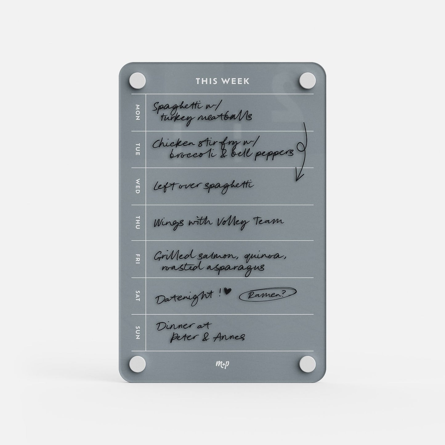 The "This Week 69" clear acrylic organizer serves as a meal planner, with handwritten meals like spaghetti with turkey meatballs, chicken stir fry, volleyball team wings, grilled salmon, date night, and dinner at Peter & Anne’s.