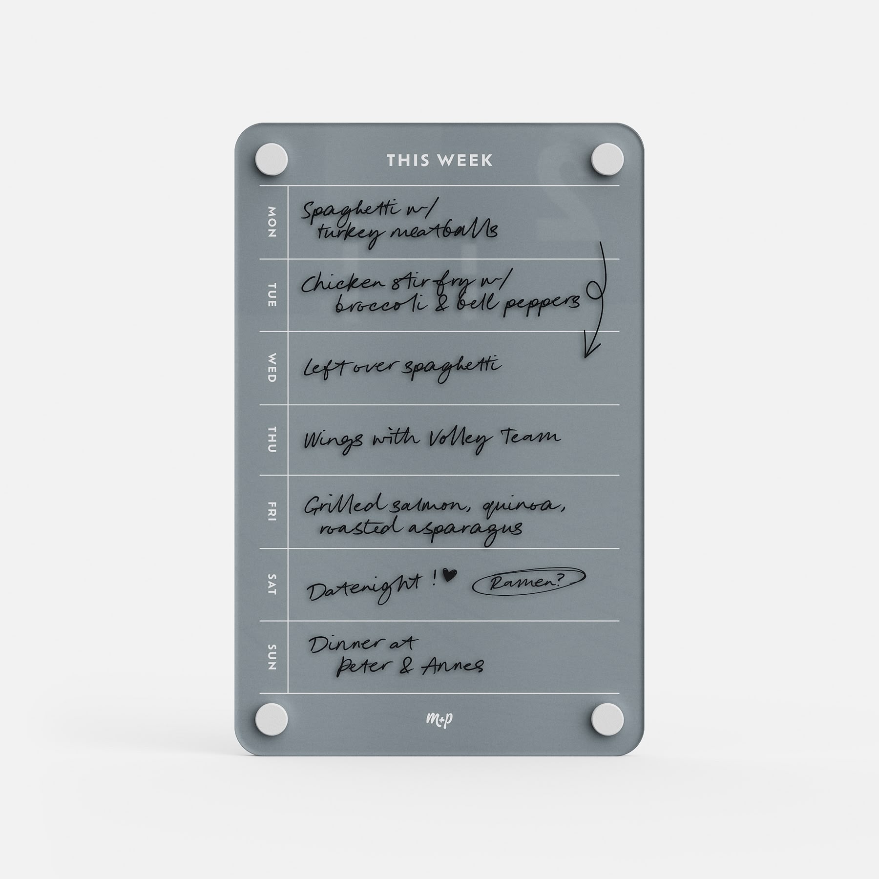 The "This Week 69" clear acrylic organizer serves as a meal planner, with handwritten meals like spaghetti with turkey meatballs, chicken stir fry, volleyball team wings, grilled salmon, date night, and dinner at Peter & Anne’s.