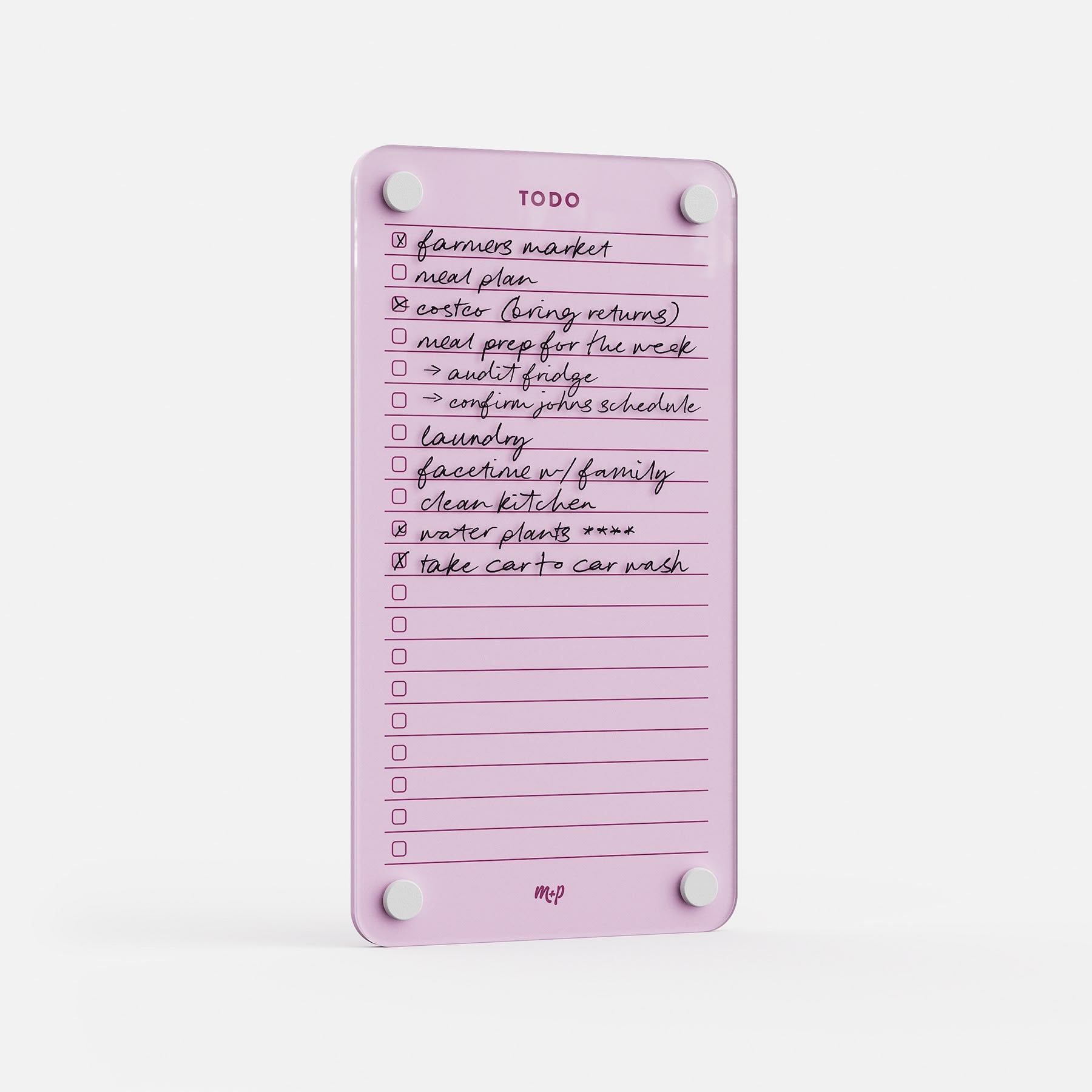 Todo List 59 is a pink reusable to-do board featuring handwritten tasks in black ink, white circular magnets at the corners, and sections for checked or crossed-off items—making it a stylish, effective daily task organizer.