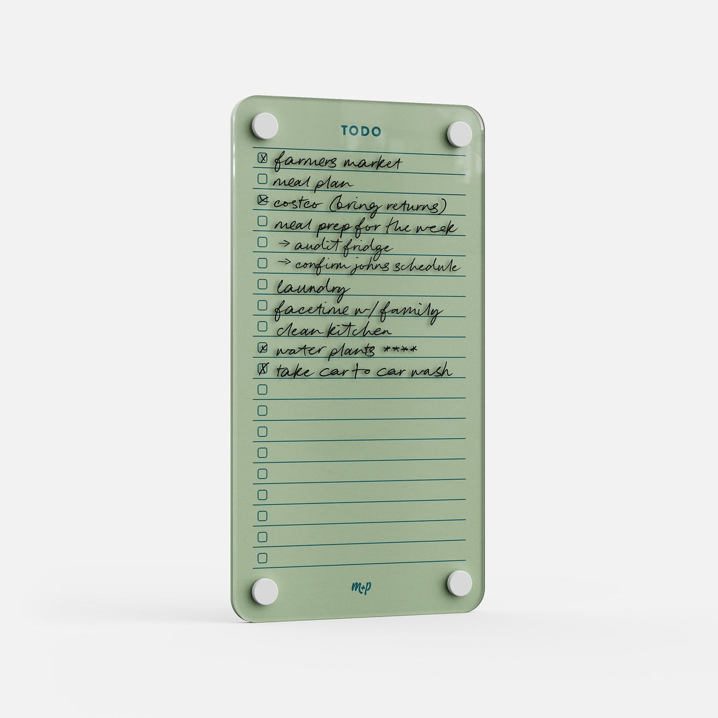 The Todo List 59 is a green reusable to-do board featuring handwritten tasks—farmers market, meal plan, clean kitchen, car wash. Four magnets hold this daily organizer, with some items already checked off for efficient task tracking.