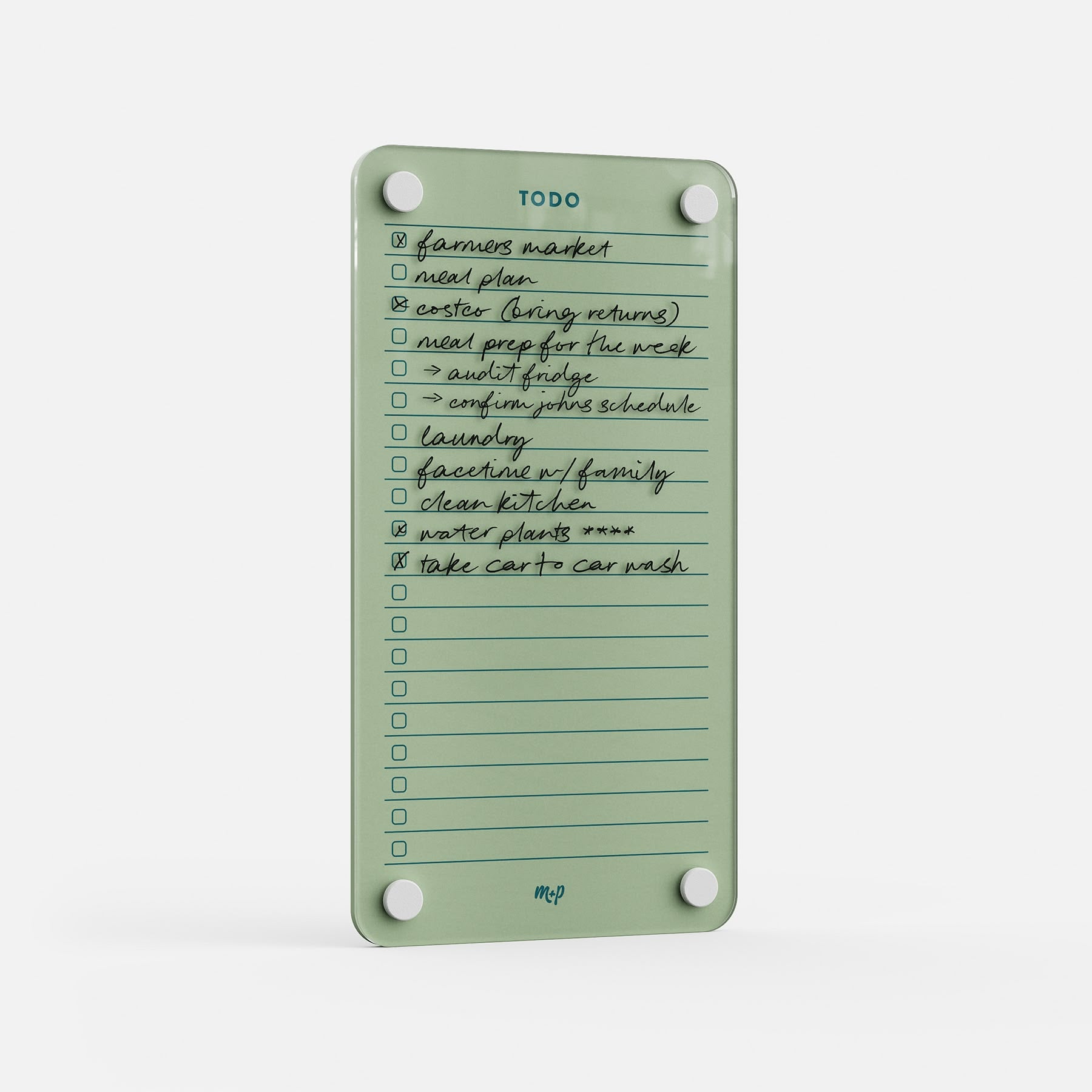 The Todo List 59 is a green reusable to-do board featuring handwritten tasks—farmers market, meal plan, clean kitchen, car wash. Four magnets hold this daily organizer, with some items already checked off for efficient task tracking.