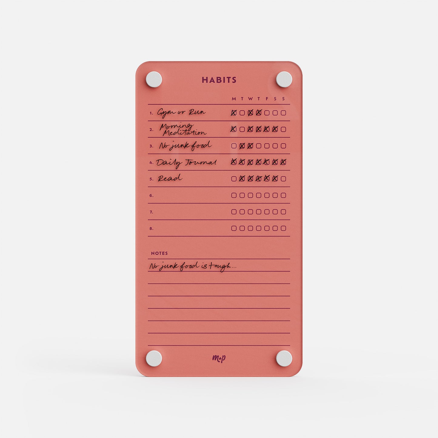 The Weekly Habits 59 is a pink habit tracker for monitoring six daily habits, with weekday checkboxes (some checked) and notes like "No junk food is tough." Four white magnets keep the board securely in place.