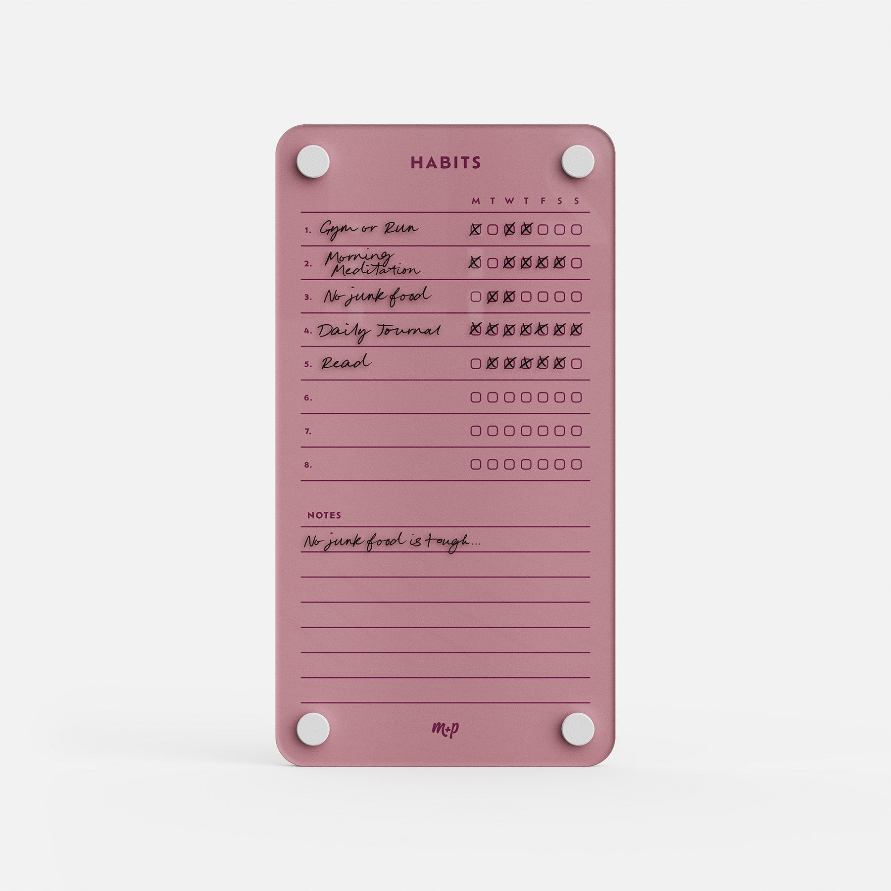 Weekly Habits 59 is a pink magnetic tracker and goal board that lists daily habits like exercise, meditation, and reading with weekly checkboxes—some checked—plus space for handwritten progress notes at the bottom.