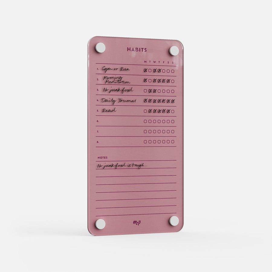 Weekly Habits 59: A pink habit tracker with checkboxes for Gym or Run, Morning Meditation, No junk food, Daily Journal, and Read—perfect for your goal board. The notes section reads: "No junk food is tough.