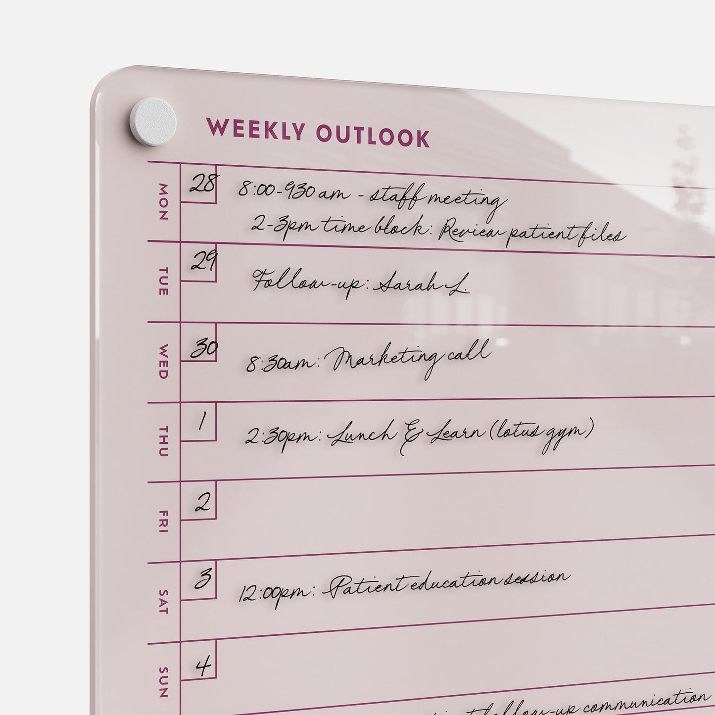The Weekly Outlook 811 is a whiteboard weekly planner featuring days of the week listed vertically, used as a productivity organizer. Handwritten black marker notes for appointments and meetings help keep schedules visible and organized.