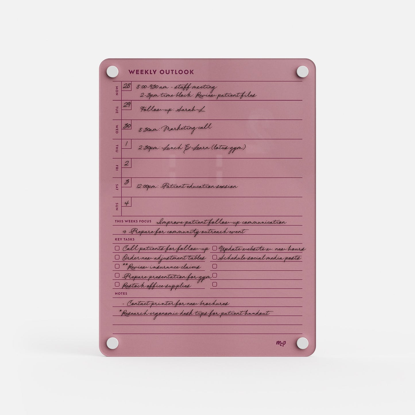 The Weekly Outlook 811 is a pink weekly planner board and productivity organizer featuring handwritten notes, time slots, checkboxes, sections for top priorities, key tasks, notes, and four visible corner screws.